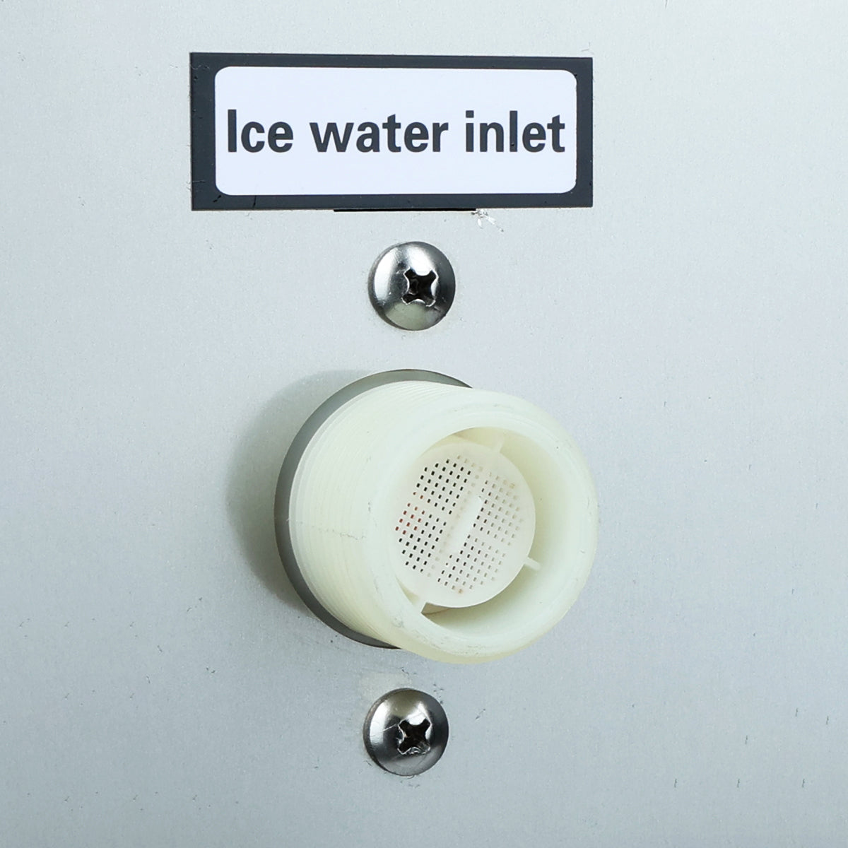 Close-up of Empura E-MCH350 ice machine's water inlet connection, designed for easy hose attachment in restaurant kitchens