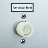 Close-up of Empura E-MCH350 ice machine's water inlet connection, designed for easy hose attachment in restaurant kitchens