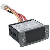 A digital temperature controller (Dixell brand) for Empura Refrigeration, featuring a black display screen, gray control buttons on both sides, and attached red, yellow, orange, and black wires. The top label shows technical specs and wiring diagrams.