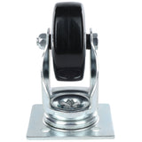 A black swivel caster without brake from Empura Parts is shown upright with a metal mounting plate. The wheel sits within a shiny, silver frame, and the base has four holes for mounting. The image is taken against a plain white background.
