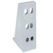 A light gray metal L-shaped Door Hinge Bracket stands upright, featuring two columns of three rounded rectangular holes each on the vertical face. This Empura Parts bracket has clean, smooth surfaces and a sturdy appearance for reliable support.