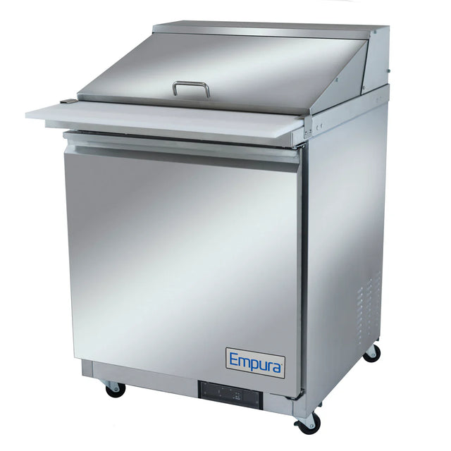 A stainless steel Empura refrigerated sandwich prep table with a closed lid and white cutting board attached to the front. This mega top prep table features a solid door, four caster wheels, and the Empura refrigeration logo near the bottom.