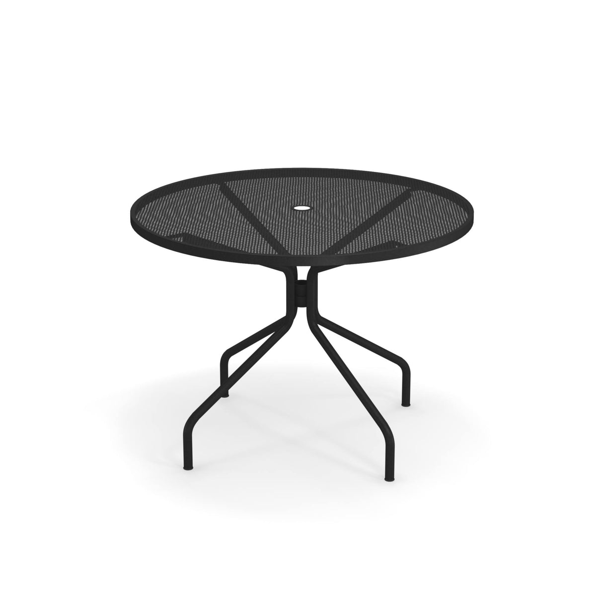 The Cambi Table is a black metal round outdoor table with a mesh top and a central hole for an umbrella. Its four angled, curved legs meet at the center and spread outward, offering stability with a minimalist, modern design.
