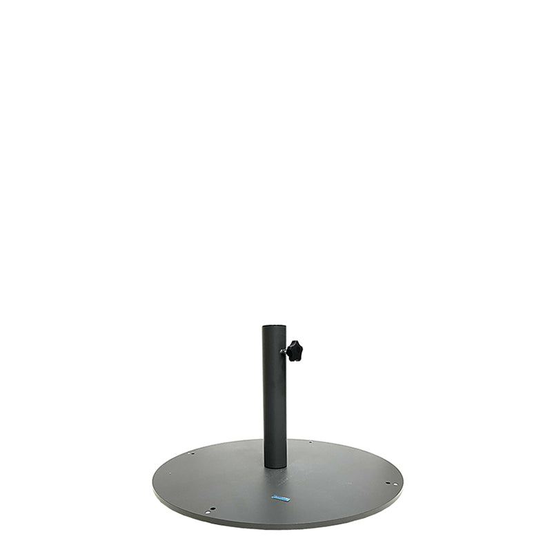 A round, flat, dark gray steel base with a vertical central pole and an adjustable knob on the side, designed to hold a patio or outdoor Shade Umbrella Base securely in place. The 24" dia. base has bolt holes around its edge for extra stability.