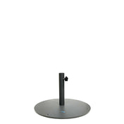 A round, flat, dark gray steel base with a vertical central pole and an adjustable knob on the side, designed to hold a patio or outdoor Shade Umbrella Base securely in place. The 24" dia. base has bolt holes around its edge for extra stability.
