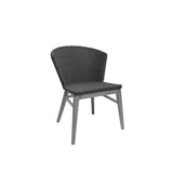 The Elly Side Chair features a curved, woven all-weather wicker backrest and seat in dark gray, supported by an aluminum frame and four angled, light gray wooden legs. Photographed against a plain white background.