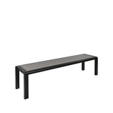 A modern outdoor bench, the Sid Bench showcases a rectangular seat of gray wooden slats and a sleek black aluminum frame. With no backrest or armrests, its simple, clean lines offer a minimalist look against a plain white background.