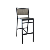 The Sid Barstool features a black aluminum frame and all-weather wicker seat and backrest. Its modern, minimalist design includes straight legs with a footrest and an open area beneath the seat, set against a plain white background.