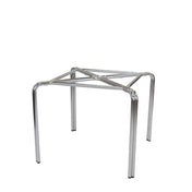 A simple, metallic Zeus Table Base with four straight legs and a frame made of chrome-plated metal tubing, featuring crossbars for support. This dining height stand has an open design with no top, sides, or bottom panels, placed against a white background.