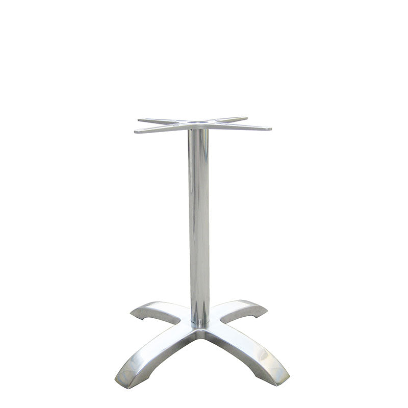 The Zak Table Base is a silver cast aluminum table base with a central cylindrical support and four wide, arched legs for stability at dining height. The top features a cross-shaped bracket to attach a tabletop, set against a plain white background.