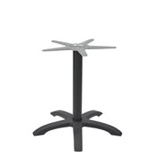 The Zak Table Base features a dining height, black metal frame with a central cylindrical column, four flat feet for stability, and a cross-shaped top plate. Simple and modern, it's crafted from cast aluminum to support your tabletop securely.