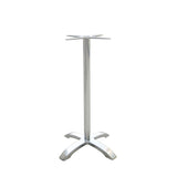 The Zak Table Base features a bar height, silver cast aluminum build with a tall cylindrical center pole, an X-shaped support for attaching a tabletop, and four curved legs for stability, shown on a white background.
