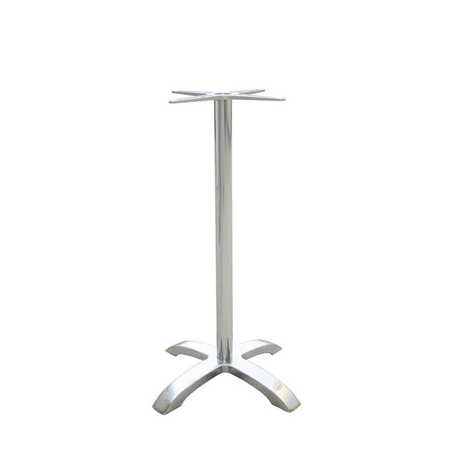 The Zak Table Base features a bar height, silver cast aluminum build with a tall cylindrical center pole, an X-shaped support for attaching a tabletop, and four curved legs for stability, shown on a white background.