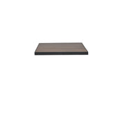 A rectangular wood-look aluminum surface with dark edges is centered against a plain white background. The surface, appearing to be an outdoor table top or shelf, is viewed from a low, straight-on angle.
