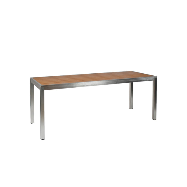 The Sid Community Dining Table features a modern, minimalistic design with a smooth wood-look aluminum top and silver metal legs. Ideal as an outdoor/indoor dining table, its clean lines and warm finish offer versatile, contemporary style.
