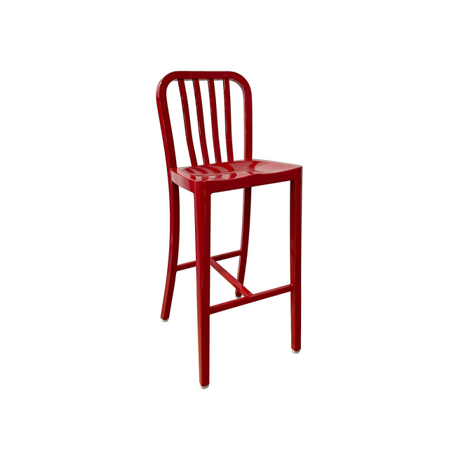 The Anna Barstool features a shiny red brushed aluminum finish with a slatted, curved backrest and round seat. Designed for outdoor/indoor use, it has four straight legs with horizontal support bars, set against a plain white background.