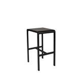 The Sid Barstool features a black, modern, minimalist design with a square flat seat and four straight legs in wood-look aluminum, perfect for outdoor/indoor spaces. Its sleek lines stand out against a plain white background.