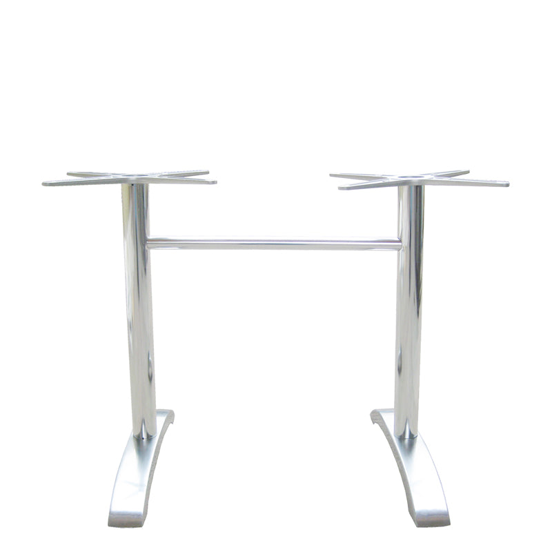 The Zak Table Base is a silver cast aluminum table base with two vertical supports ending in four-pronged mounts for tabletops. Joined by a horizontal bar near the top, it features two wide, curved legs for stability. Ideal for dining height settings.