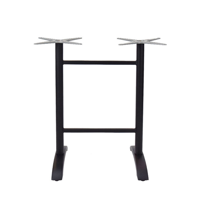 A black metal Zak Table Base, bar height, features two vertical legs joined by a horizontal bar and flat cross-shaped mounting plates atop each leg; the cast aluminum feet are flat and curve slightly outward for added stability.