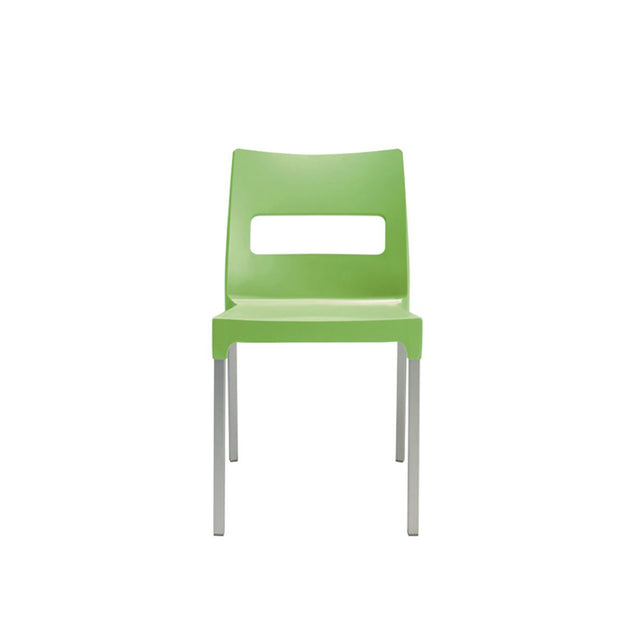 A simple green Olly Stacking Side Chair with a rectangular cutout in the backrest and straight silver metal legs, photographed from the front against a plain white background.