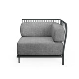 A modern Cannolè Lounge Right Corner Module with a black steel wire back, vertical slat backrest, and thick, light gray upholstered seat and back cushions. Its minimalist design suits both outdoor indoor spaces, shown against a plain white background.