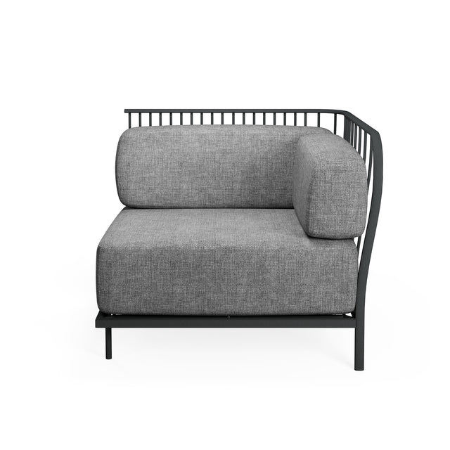 A modern Cannolè Lounge Right Corner Module with a black steel wire back, vertical slat backrest, and thick, light gray upholstered seat and back cushions. Its minimalist design suits both outdoor indoor spaces, shown against a plain white background.