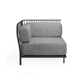 A modern Cannolè Lounge Left Corner Module with a minimalist black steel wire back and vertical slats. Light gray cushions complement its clean lines, making it perfect for stylish outdoor/indoor spaces against a plain white background.