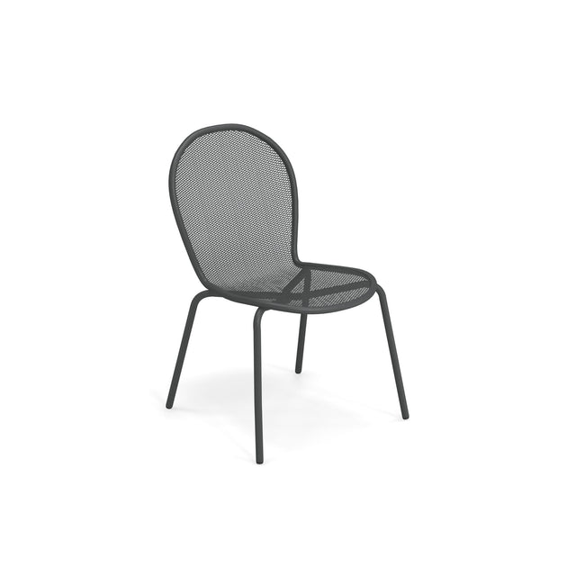 A modern black steel mesh chair with a rounded mesh backrest and seat, supported by four slender, slightly angled legs. This minimalist indoor outdoor chair offers an airy design, photographed on a white background.