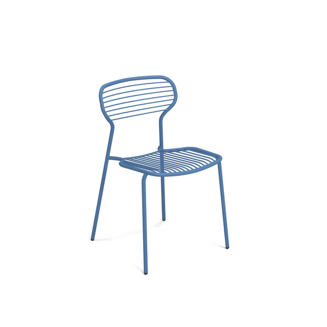 A minimalist blue Apero Stacking Side Chair made of e-coated steel with a wireframe design. Horizontal metal rods form the backrest and seat, and four slender legs complete this outdoor stacking chair’s modern, open look against a plain white background.