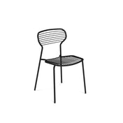 A minimalist black metal chair with a wireframe design, crafted from powder coated steel. The Apero Stacking Side Chair features horizontal metal rods and four slender legs, perfect as an outdoor/indoor chair. The background is plain white.