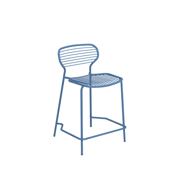 A minimalist blue steel barstool with a curved backrest and seat, both made of horizontal metal rods. The chair has four thin legs and a lower footrest, all constructed from the same blue metal, ideal as an outdoor barstool against a white background.