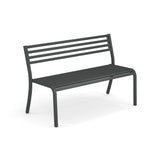 A simple, modern Segno Stacking Bench made of dark gray steel, featuring a slatted seat and backrest with three horizontal slats. This outdoor bench has four straight legs, no armrests, and is set against a plain white background.