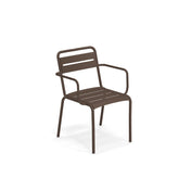The Star Stacking Armchair features brown steel slats on the seat and backrest, with straight legs and rounded armrests. Its simple, modern design suits both outdoor/indoor spaces, photographed against a plain white background.