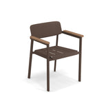 The Shine Stacking Armchair is a brown aluminum armchair with a simple, modern design, wooden armrests, and slits in the seat—perfect as an outdoor/indoor chair for versatile spaces.