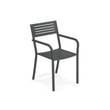 A black Segno Stacking Armchair with a slatted backrest and seat, featuring armrests and four straight legs. This steel slat chair offers a simple, modern design, perfect as an outdoor indoor chair. Photographed against a plain white background.