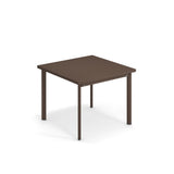 A simple, square, brown outdoor table with four sturdy legs, placed on a white background. The table features a solid steel top with clean lines and no adornments, giving it a minimalist and modern appearance.