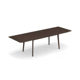 A brown Plus4 Extension Table with legs, perfect as an outdoor/indoor table.