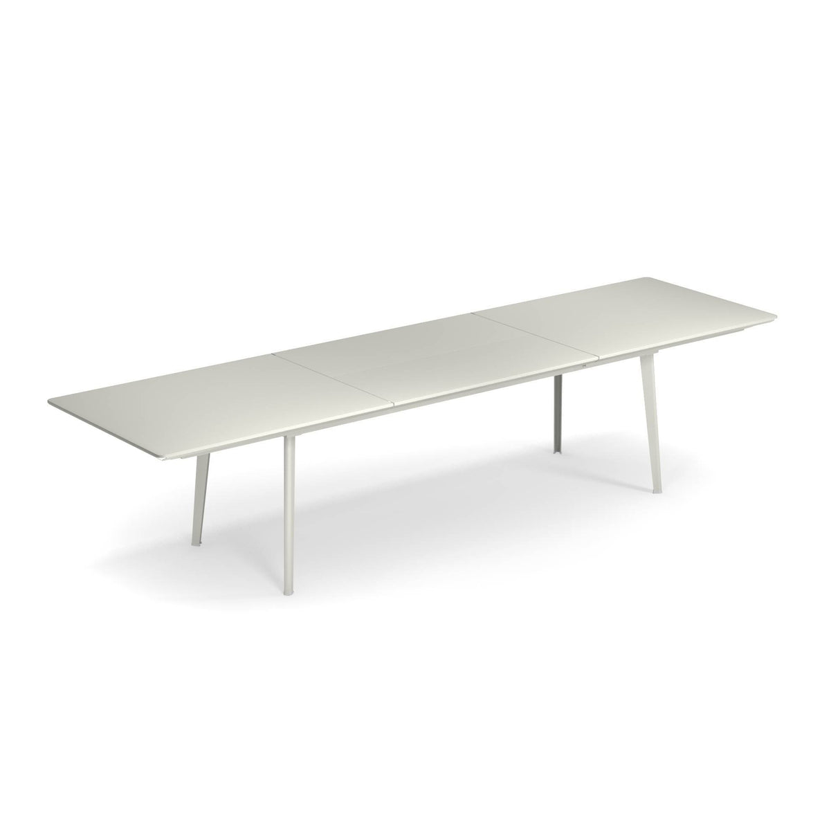 A long, modern rectangular extension table with a minimalist design, featuring a smooth, solid steel top and four slender, angled legs. The table has three distinct segments and suits both outdoor/indoor settings, set against a plain white background.