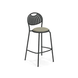 A tall steel barstool with a black metal frame, curved legs, and a light grey circular seat. The backrest features a fan-like pattern, and a footrest connects the front legs. Perfect as an indoor outdoor barstool, it stands against a white background.