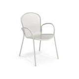 A white Ronda 2.0 Armchair with a perforated mesh seat and backrest, rounded armrests, and four slender legs. The simple and modern steel mesh armchair suits both indoor and outdoor use, set against a plain white background.