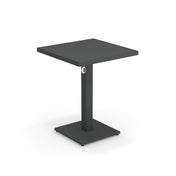 A modern, square, dark gray Lock Table with a minimalist design, crafted from e-coated steel for outdoor/indoor use. It features clean lines, a single central support column, and a small round hole near the top of the column.