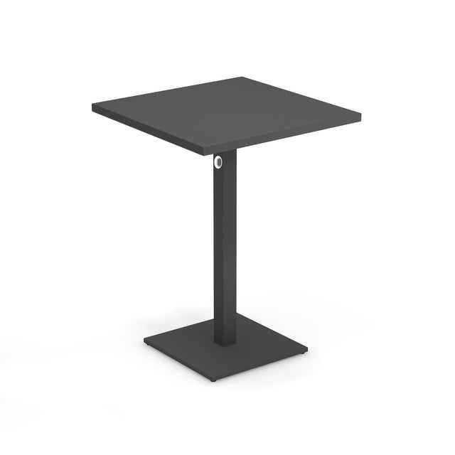 A modern, minimalist black square Lock Table with a flat top, single central support, and a square base. Featuring an e-coated powder coat finish, this outdoor indoor table includes a subtle circular detail near the top of the support.