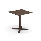 A small, brown, square Darwin Tilt Top Table with a single central pedestal and four flat legs extending outwards in a cross shape. This versatile outdoor/indoor table is set against a plain white background.