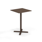 A small, modern brown Darwin Tilt Top Bar Table with a square top, a single central pedestal, and a four-pronged base. The minimalist design features smooth edges and a matte finish, showcased on a plain white background.