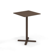 A small, modern brown Darwin Tilt Top Bar Table with a square top, a single central pedestal, and a four-pronged base. The minimalist design features smooth edges and a matte finish, showcased on a plain white background.