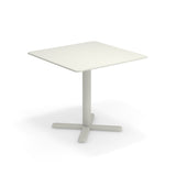 A simple square white Darwin Tilt Top Table with rounded corners, a single central pedestal leg, and a four-pronged base, all in matching white solid steel, perfect as an outdoor/indoor table set against a plain white background.