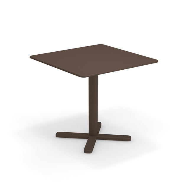 A simple brown Darwin Tilt Top Table with a single central pedestal base and four feet extending outward in a cross shape, set against a white background.