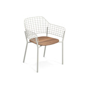 The Lyze Stacking Armchair features a white metal wire grid stainless steel back and armrests, four thin white legs, and a flat wooden seat—a minimalist outdoor indoor chair blending industrial and natural materials on a plain white background.