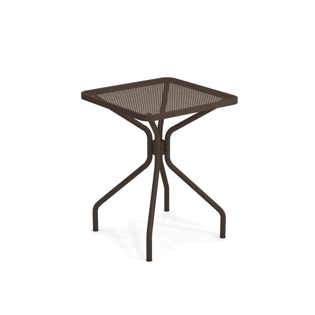The Cambi Table is a small, square outdoor/indoor table with a brown mesh top. Its four slightly curved legs meet at the center for a sturdy, modern design, while the mesh surface and open frame lend it a lightweight appearance.