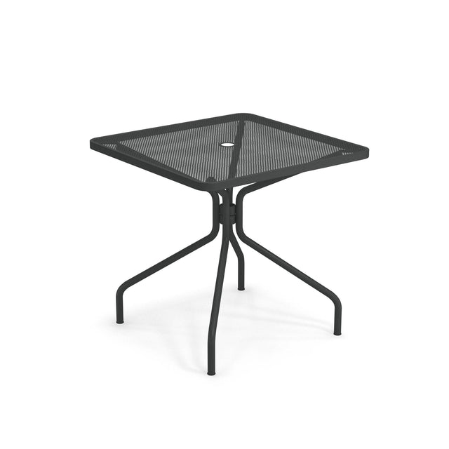 The Cambi Table features a black square metal frame with a mesh top, rounded corners, and a central umbrella hole. Its four curved legs provide sturdy support, making this simple, modern table perfect for outdoor/indoor use.